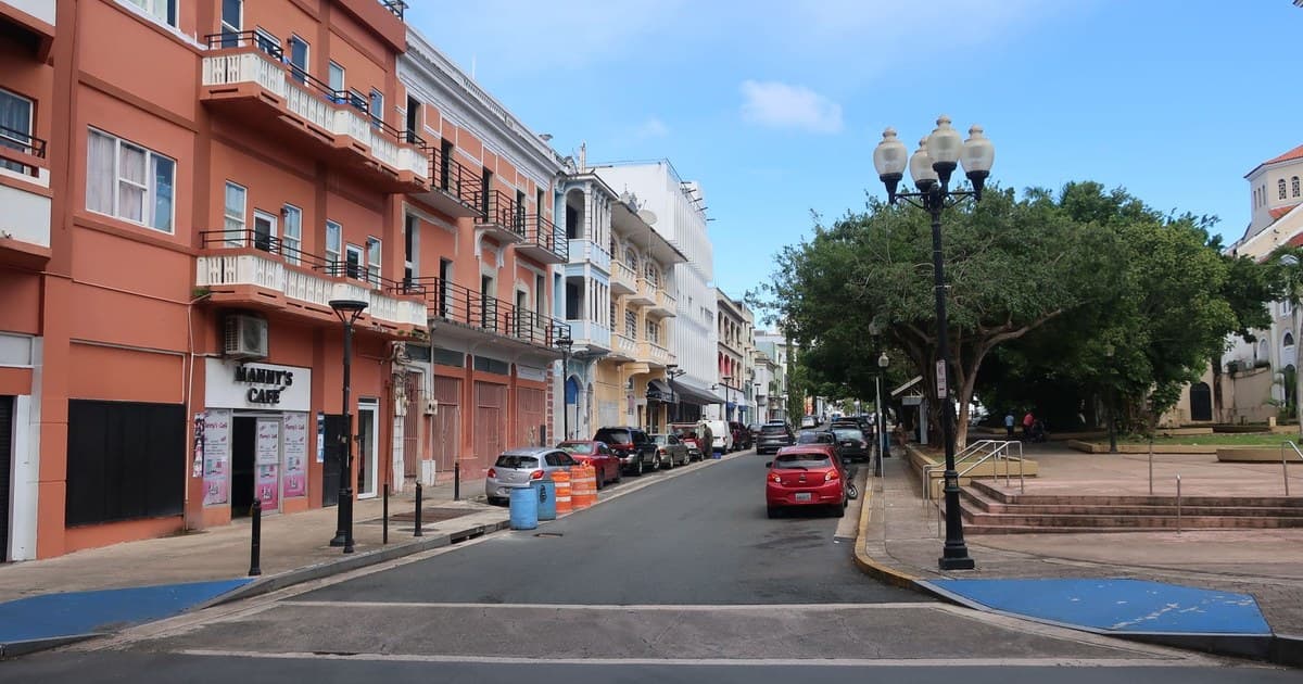 Colorful colonial buildings line a quiet street in Old San Juan, perfect for urban exploration.